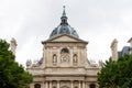 The dome of the Chapel of the Sorbonne University against the grey sky in Paris Royalty Free Stock Photo